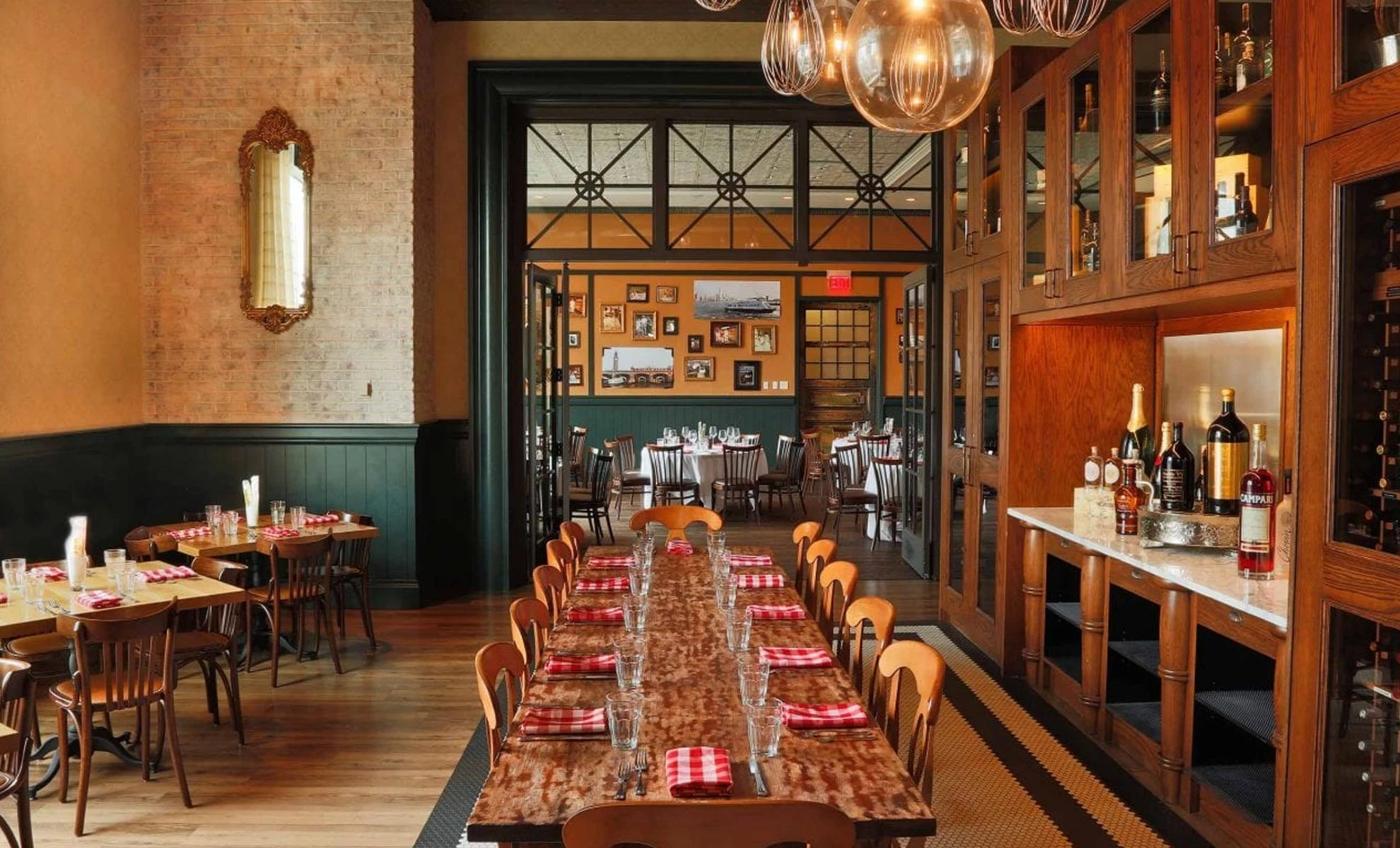 The Change Table dining room with warm lighting and set tables